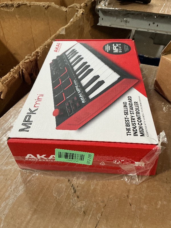 Photo 1 of Akai Professional MPK Mini MK3-25 Key USB MIDI Keyboard Controller With 8 Backlit Drum Pads, 8 Knobs, Music Production Software and Native Instruments Sound Package (NKS Integration)