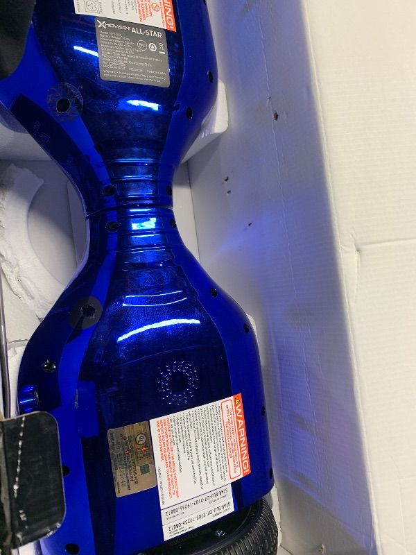 Photo 1 of **PARTS ONLY CRACKED AND LOSSE PARTS INSIDE**
Hover-1 All-Star Self Balancing Scooter 7MPH Top Speed, 7MI Range, Dual 200W Motor, 5HR Recharge, 220lbs Max Weight, LED Wheels & Headlights