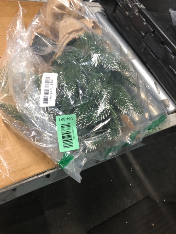 Photo 1 of ***(BATTERY OPERATED)***MorTime 24 Inch Mini Artificial Christmas Tree with 50 LED Lights, 2 ft Table Top Christmas Pine Tree 29 Tips with Burlap Wooden Base, Christmas Winter Home Decorations