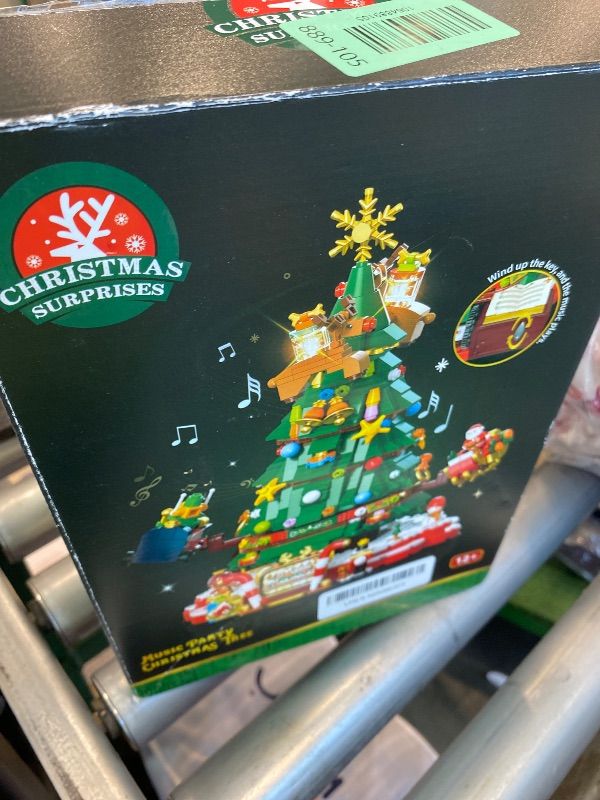 Photo 1 of *USED*
JAKI Christmas Tree Building Set, Rotating Music Box Christmas Tree with Lights, Christmas Decorations for Tabletop & Home, for Boys & Girls Ages 8+