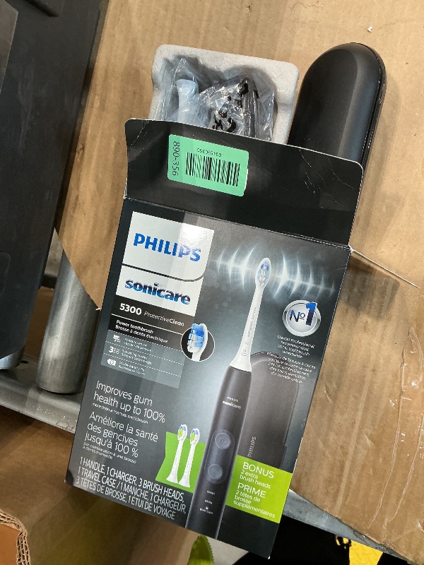 Photo 1 of *MINOR DAMAGE - USED*
Philips Sonicare ProtectiveClean 5300 Rechargeable Electric Toothbrush, with Pressure Sensor, 3 Cleaning Modes, SmarTimer and QuadPacer, with 2 Bonus Brush Heads, Travel Case, Black, Model HX6423/34