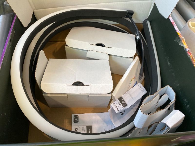 Photo 1 of ***MISSING BRACKETS*** Philips Hue Play Gradient 65" Smart TV Light Strip, Flowing Color-Changing LED Strip Lights, Multicolor TV Backlight Sync with Music and Gaming, Requires Bridge & Sync Box, Control with App and Voice