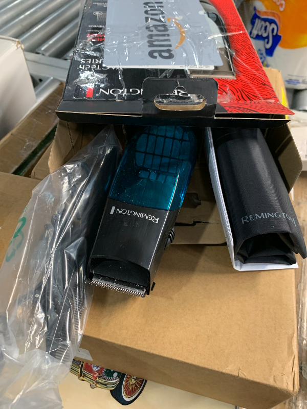 Photo 1 of ***(HEAVILY USED/ MISSING PARTS)***Remington Vacuum Haircut Kit, Vacuum Beard Trimmer, Hair Clippers for Men with Removable Hair Chamber and Dual Motor Power (18 pieces)