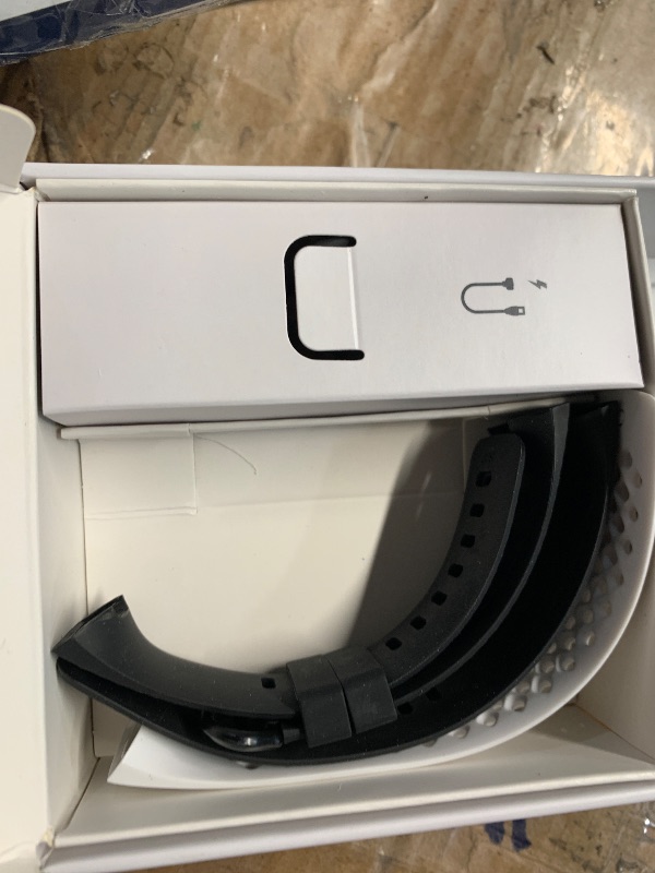 Photo 1 of ***(HEAVILY USED/ MINOR DAMAGE)***Fitbit Charge 3 SE Fitness Activity Tracker Graphite/White Silicone, One Size (S and L Bands Included),1 Count (Pack of 1)