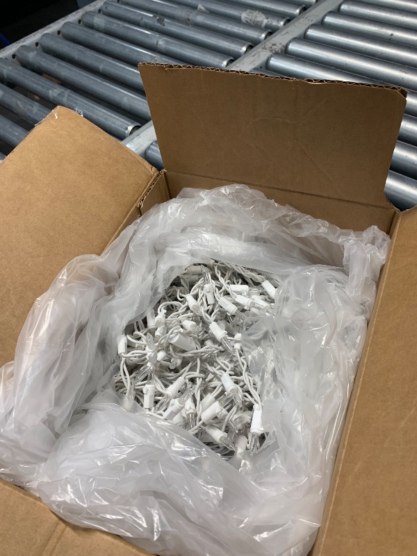 Photo 1 of ***STOCK PHOTO FOR REFERENCE ONLY***Novelty Lights 25ft Christmas String Lights, 50 Pure White LED Bulbs on White Wire, 6" Spacing, Connectable Indoor Outdoor Commercial Grade Lighting for Holidays Patio Weddings