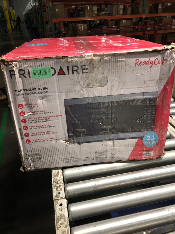 Photo 1 of ***DAMAGED - SEE NOTES/PICTURES*** FRIGIDAIRE 2.2 Cu. Ft. Stainless Steel Microwave Oven, Multi Function, Programmable, 1,200 Watts