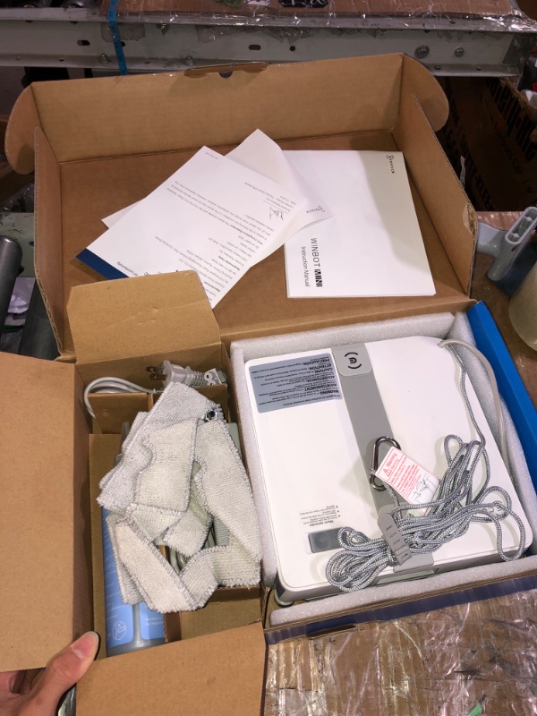 Photo 2 of ECOVACS WINBOT Mini Window Cleaning Robot - Compact Design, Dual Nozzles with Ultrasonic Spray, 9-Stage Protection System, Intelligent Path Planning, 3 Cleaning Modes, Anti-Slipping System