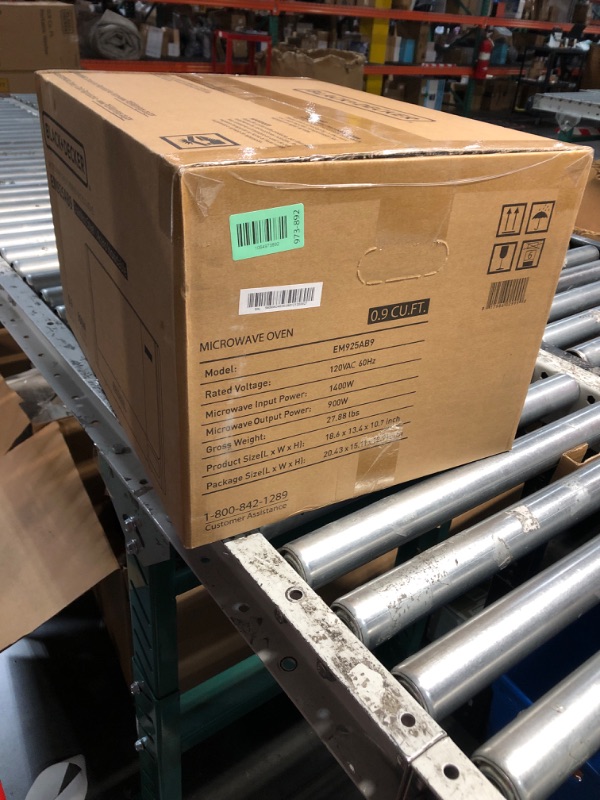 Photo 1 of ***FACTORY SEALED*** BLACK+DECKER Digital Microwave Oven with Turntable Push-Button Door, Child Safety Lock, Stainless Steel, 0.9 Cu Ft