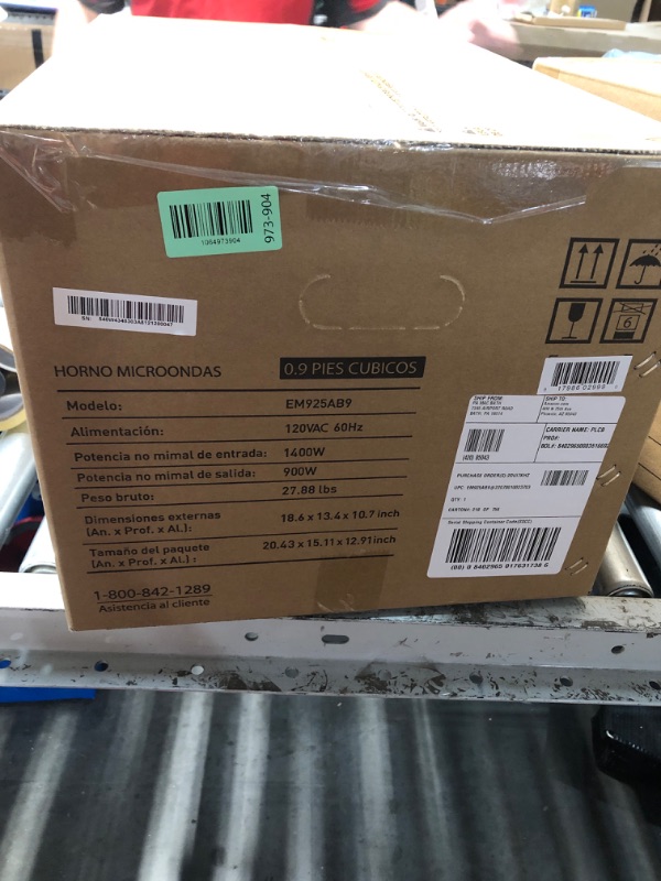 Photo 1 of ***FACTORY SEALED*** BLACK+DECKER Digital Microwave Oven with Turntable Push-Button Door, Child Safety Lock, Stainless Steel, 0.9 Cu Ft