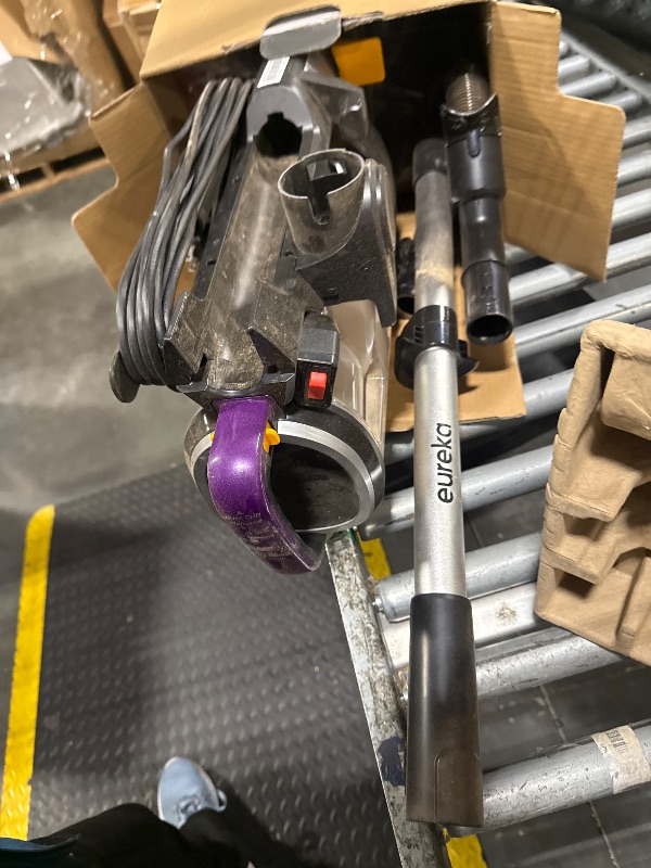 Photo 1 of ***VERY USED/ VERY USED*** Eureka FlexReach Powerful Upright Vacuum Cleaner for Carpet and Hard Floor, Lift-Up Vacuum with Large Dust Cup, Anti-Tangle, NEU651PL, Purple