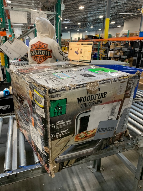 Photo 1 of *MINOR DAMAGE - USED*
Ninja Woodfire Outdoor Pizza Oven, 8-in-1 Portable Electric Roaster Oven, Heats up to 700°F, 5 Artisan Pizza Settings, Integrated BBQ Smoker Box, Includes Flavored Wood Pellets, Terracotta Red
