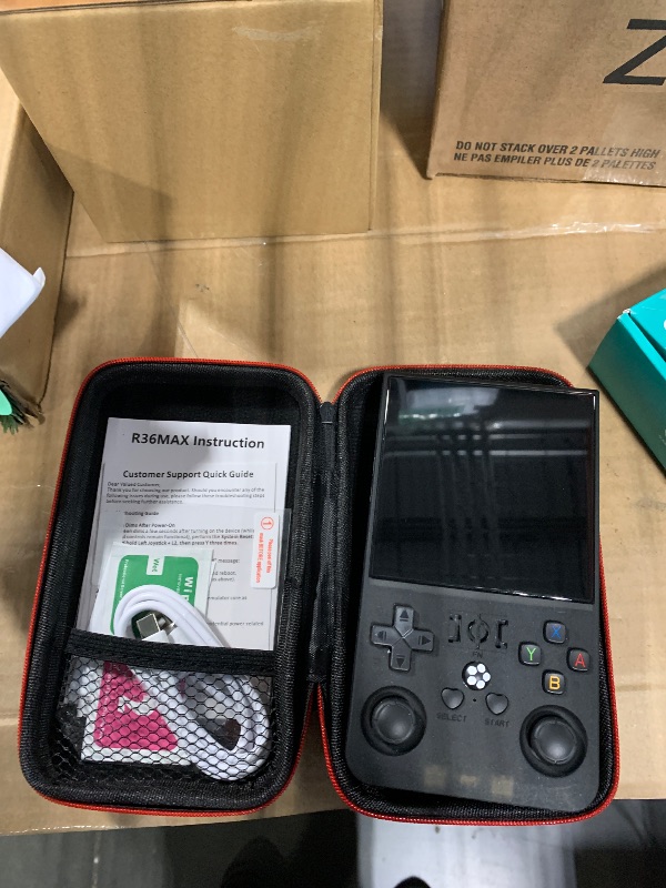 Photo 1 of ?R36MAX 4000mAh Portable Rechargeable Handheld Retro Game Console,Comfort Non-Slip Handheld Standing Retro Game Console with 64G TF Car,4.0-inch Screen,for Office,Black