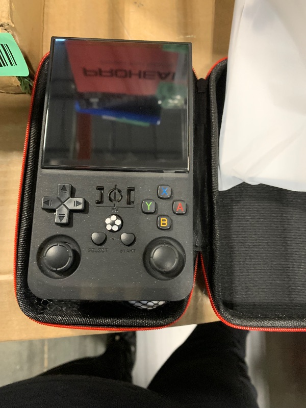 Photo 1 of ?R36MAX 4000mAh Portable Rechargeable Handheld Retro Game Console,Comfort Non-Slip Handheld Standing Retro Game Console with 64G TF Car,4.0-inch Screen,for Office,Black