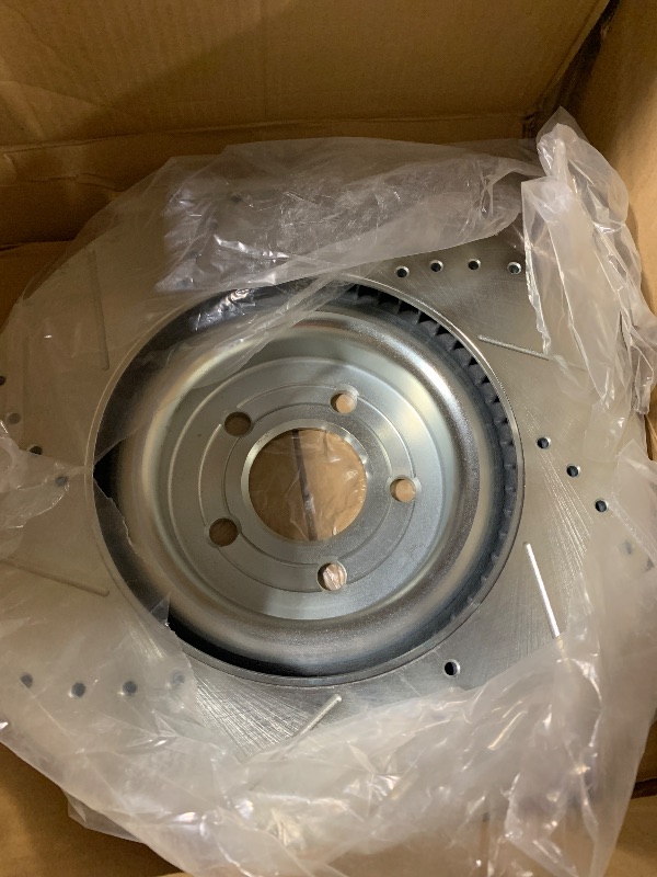 Photo 1 of **SIMILAR ITEM** **UNKNOWN ACTUAL SPECIFICATIONS**  Slotted Brake Rotors (2)
