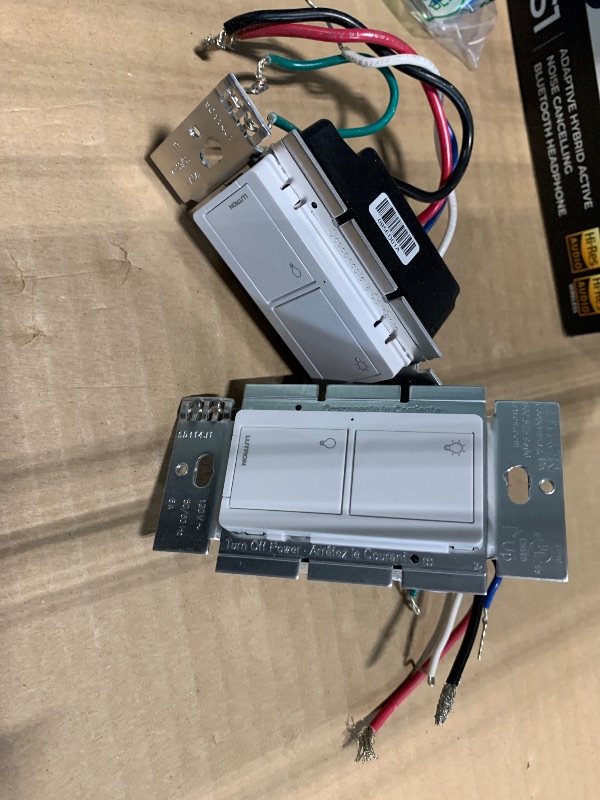 Photo 1 of *** VERY USED *** Lutron Caseta Original Smart Switch (Lutron Smart Hub Required), for LED Lights and Fans, 6 Amp, Single-Pole/3-Way, Neutral Required, PD-6ANS-WH-2, White, 2 Pack