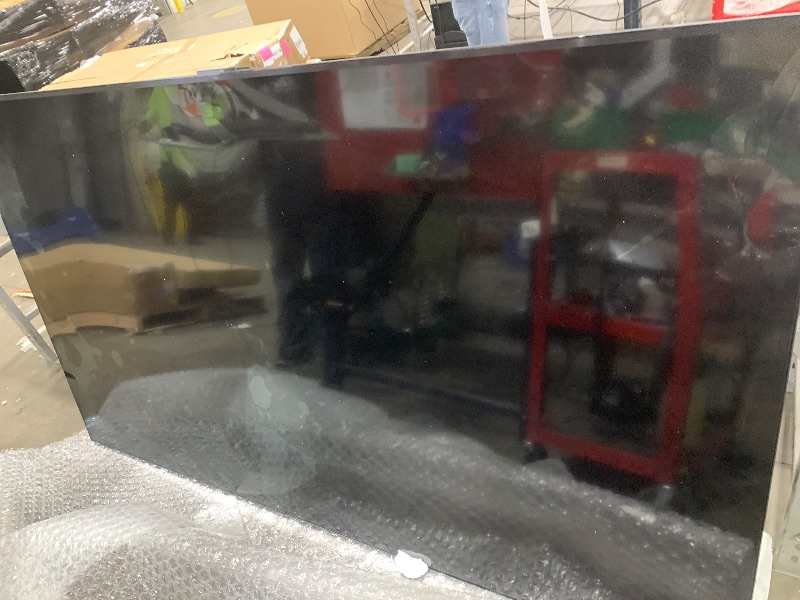 Photo 1 of ===== SEE NOTES==== TCL 98-Inch Q65 QLED 4K UHD Smart TV with Google TV (98Q651G, 2024 Model) Dolby Vision, Dolby Atmos, HDR Pro+, Game Accelerator Enhanced Gaming, Voice Remote, Works with Alexa, Streaming Television