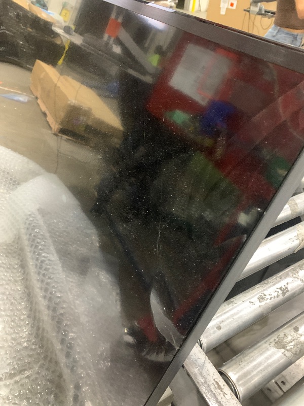 Photo 1 of ===== SEE NOTES==== TCL 98-Inch Q65 QLED 4K UHD Smart TV with Google TV (98Q651G, 2024 Model) Dolby Vision, Dolby Atmos, HDR Pro+, Game Accelerator Enhanced Gaming, Voice Remote, Works with Alexa, Streaming Television