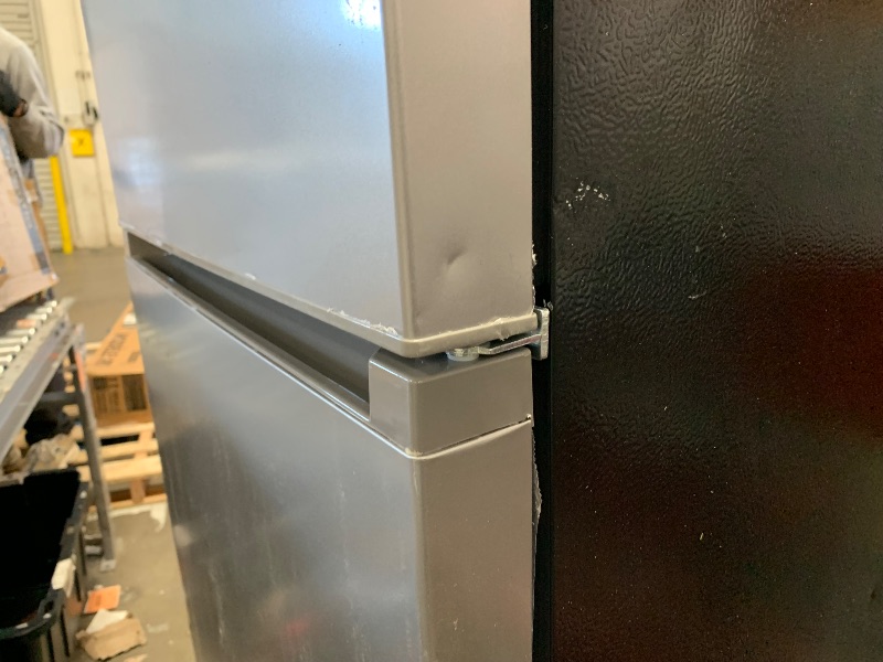 Photo 1 of ***DENTS***Frigidaire, 2 Door Apartment Size Refrigerator with Freezer, 7.5 cu ft, Adjustable Spill-Proof Shelves, Door & Crisper Bins, Platinum Silver, Garage Ready