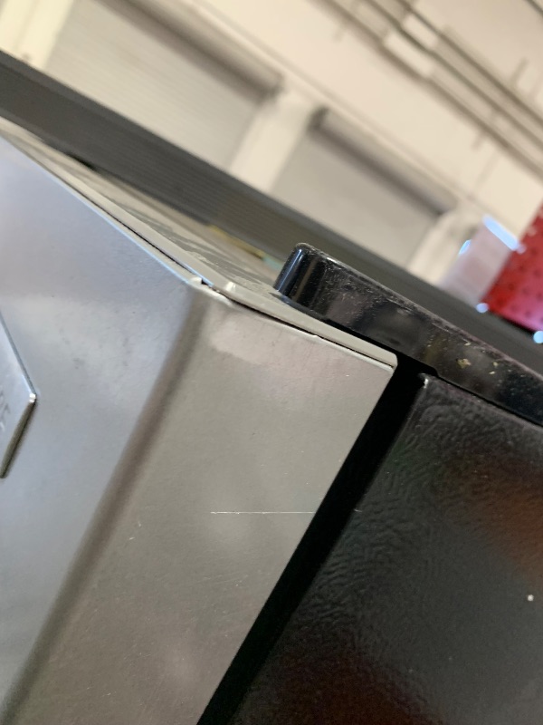 Photo 1 of ***DENTS***Frigidaire, 2 Door Apartment Size Refrigerator with Freezer, 7.5 cu ft, Adjustable Spill-Proof Shelves, Door & Crisper Bins, Platinum Silver, Garage Ready