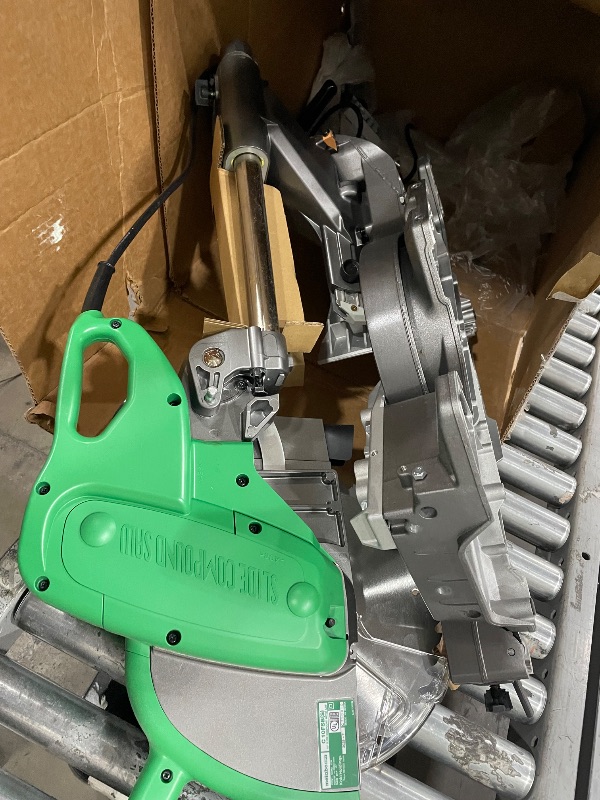 Photo 1 of 10 Inch Sliding Dual Compound Miter Saw with Laser Marker | Metabo HPT C10FSHS
