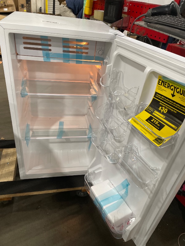 Photo 1 of (outside of box) Frigidaire Retro Compact Fridge with Chiller, 3.2 cu ft Countertop Fridge with Built-In Bottle Opener, Compact Refrigerator for Office, Bedroom, Dorm Room or Cabin - 18.7"D x 19.01"W x 33.27"H (White)(major scratches and damages)
