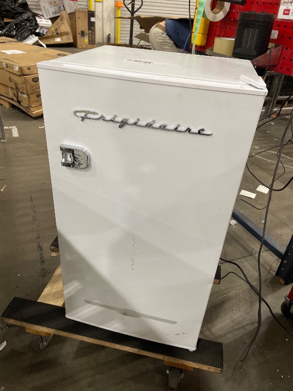Photo 1 of (outside of box) Frigidaire Retro Compact Fridge with Chiller, 3.2 cu ft Countertop Fridge with Built-In Bottle Opener, Compact Refrigerator for Office, Bedroom, Dorm Room or Cabin - 18.7"D x 19.01"W x 33.27"H (White)(major scratches and damages)