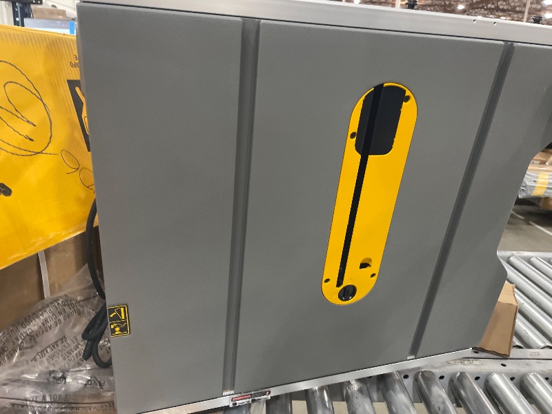 Photo 1 of ***SEE NOTES****DEWALT Table Saw 10 Inch with Foldable Rolling Table Saw Stand, 15 Amp, 4800 RPM, 32-1/2-Inch Rip Capacity (DWE7491RS)