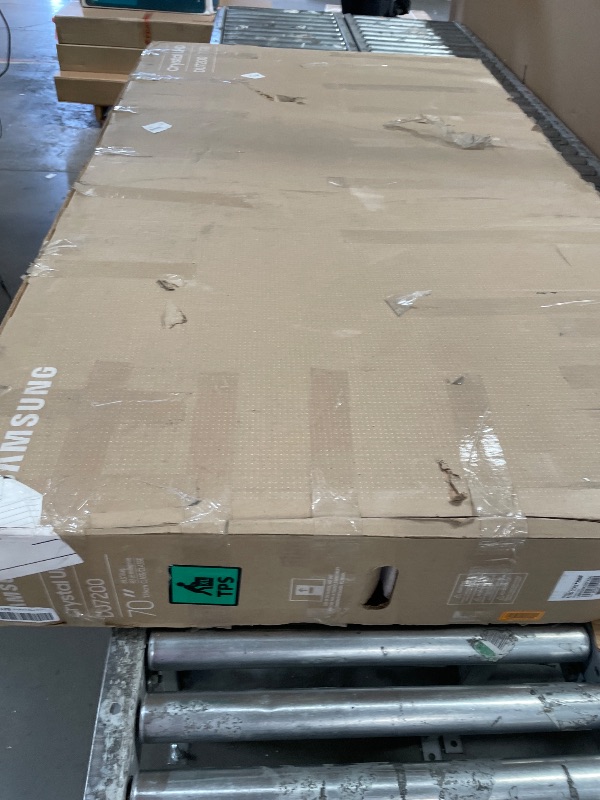 Photo 1 of **SCREEN IS BROKEN PARTS ONLY ***Samsung 70-Inch Class Crystal UHD 4K DU7200 Series HDR Smart TV w/Object Tracking Sound Lite, PurColor, Motion Xcelerator, Mega Contrast, Q-Symphony (UN70DU7200, 2024 Model)