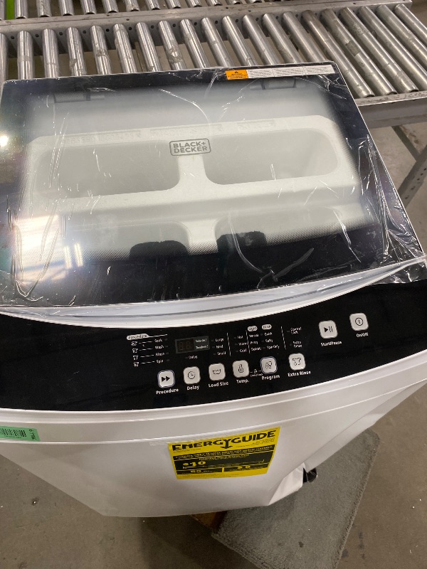 Photo 1 of *************FOR PARTS ONLY- MASSIVE DENT ON FRONT OF UNIT*************
BLACK+DECKER 3.0 Cu. Ft. Portable Washer, 26.5 lb. Capacity Washing Machine, 6 Cycles, Quick Connect Sink Adapter and Drain Hose Included, Transparent Lid & LED Display, BPW30MW, Whit