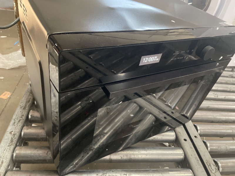 Photo 1 of ***DENTS SHOWN ON TOP **** SAMSUNG 1.2 cu. ft. Countertop Convection Microwave with Air Fry, Black Glass, MC12DB8700CKAA