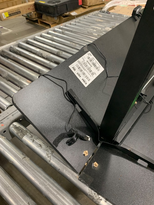 Photo 1 of **used, damaged item**
YIHAYO Electric Standing Desk, 48 x 24 Inches Stand Up Desk with Splice Board, Adjustable Height Desk, Computer Desk for Home Office, Black Frame/Black Top