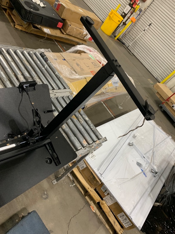 Photo 1 of **used, damaged item**
YIHAYO Electric Standing Desk, 48 x 24 Inches Stand Up Desk with Splice Board, Adjustable Height Desk, Computer Desk for Home Office, Black Frame/Black Top