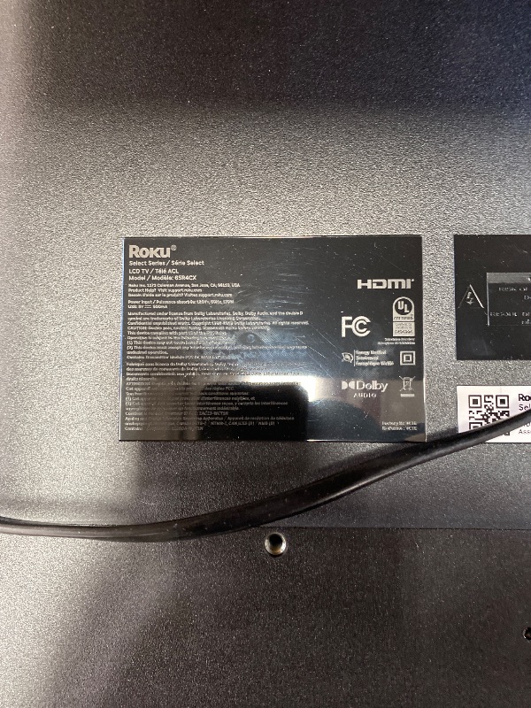 Photo 1 of **SCREEN HEAVILY DAMAGED, PARTS ONLY**Roku Smart TV 2025 – 65-Inch Select Series, 4K HDR TV – RokuTV with Enhanced Voice Remote – Flat Screen LED Television with Wi-Fi for Streaming Live Local News, Sports, Family Entertainment