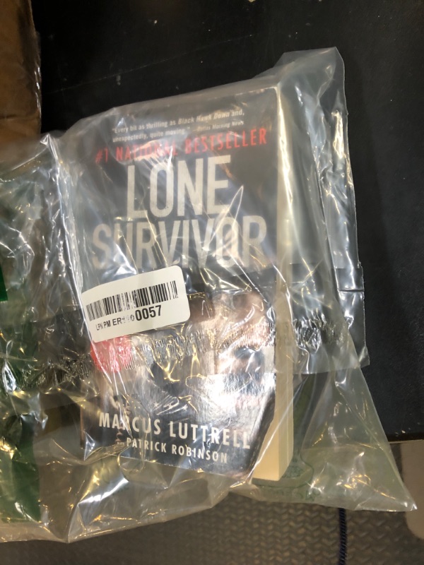 Photo 1 of (Lone Survivor: The Incredible True Story of Navy SEALs Under Siege) [By: Luttrell, Marcus] [Jan, 2014]