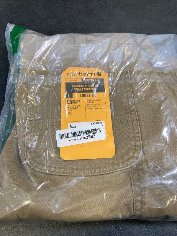 Photo 1 of Carhartt women's Rugged Flex Loose Fit Canvas work utility pants, Yukon, 2 Short US