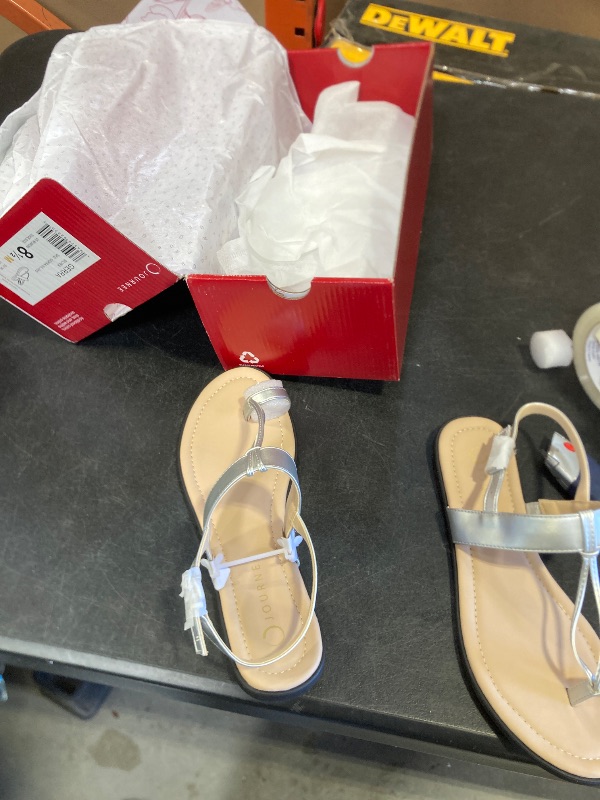 Photo 1 of Journee Collection Womens Gerra T strap Toe Ring Sandals Open Round Toe Buckle Cushioned Flat Sole Summer Shoes Silver, 8.5