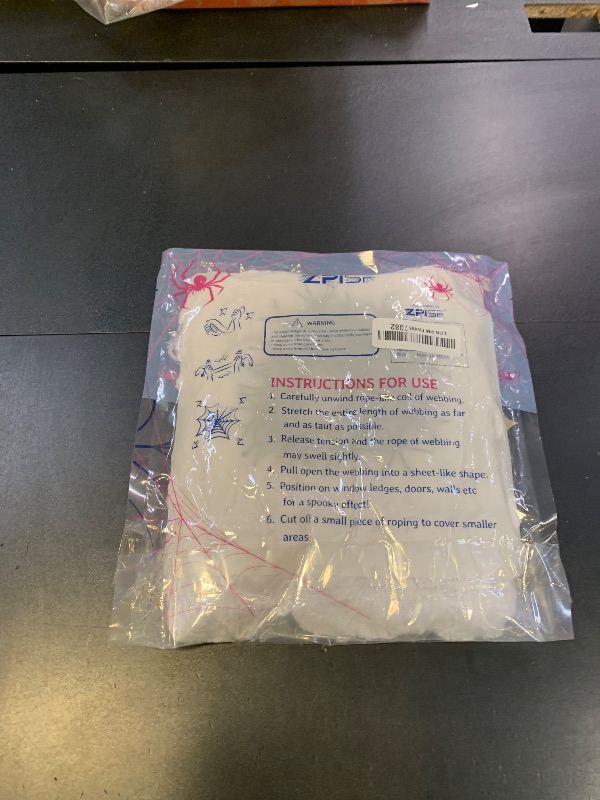 Photo 1 of 1000 sqft Spider Webs Halloween Decorations Bonus with 30 Fake Spiders, Super Stretch Cobwebs for Halloween Indoor and Outdoor Party Supplies