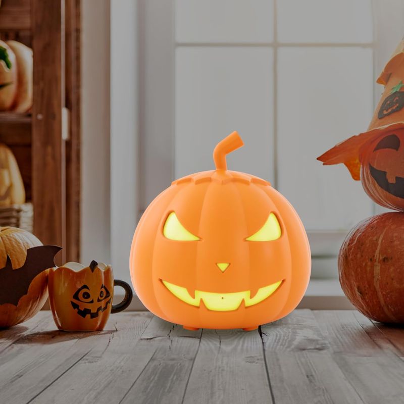 Photo 1 of 800W Fog Machine with 12 Color LED Lights, 5000 CFM Pumpkin Smoke Machine, 6.56ft Fog Distance, Fog Machine with Remote Control for Halloween, Parties, and Stage Effects