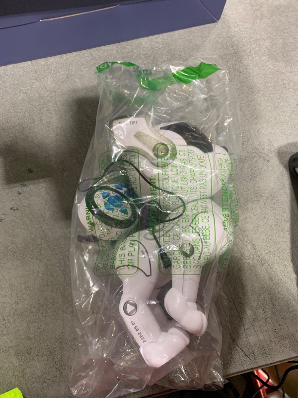 Photo 1 of ****STOCK PHOTO AS REFERENCE****

Remote Control Robot Dog Toy, RC Dog Programmable Smart Interactive Robotic Pets, RC Stunt Robot Toys Imitates Animals Music Dancing Handstand Push-up Follow Functions for Boys Girls Toy White Silver