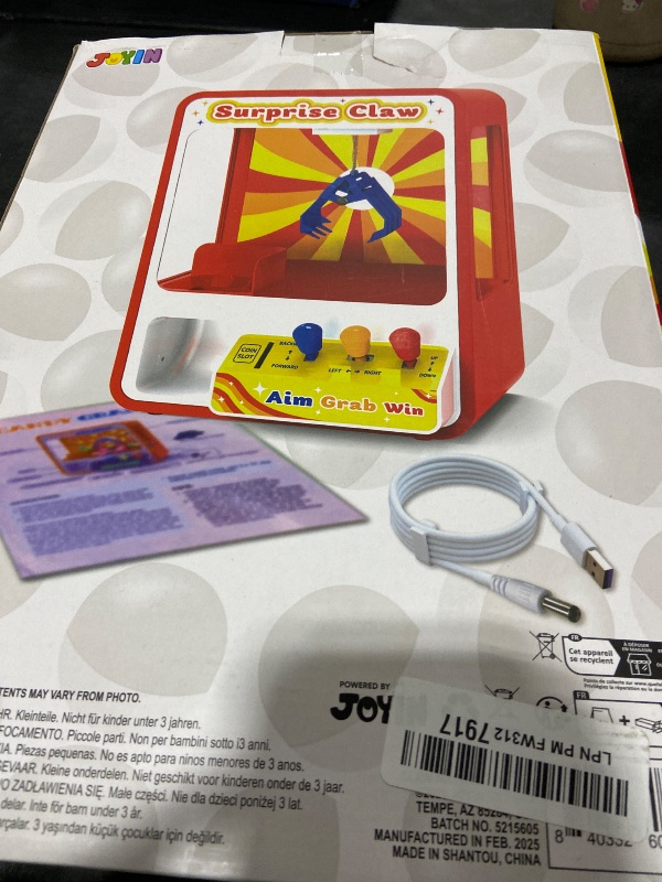 Photo 1 of JOYIN Claw Machine Arcade Toy with LED Light & Adjustable Sound, Rechargable Dispenser Toys Mini Vending Machine for Kids - Perfect Christmas & Birthday Big Gifts for Kids, Ages 3+