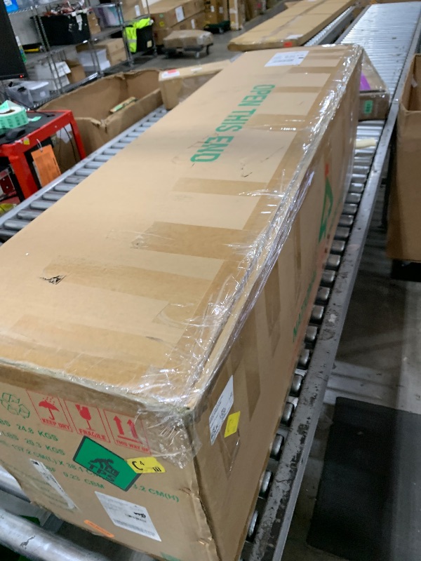 Photo 1 of National Tree Company 7.5 ft Pre-Lit Carolina Pine Artificial Christmas Tree, 750 Clear Lights, 1,399 Tips, Includes Stand, Green