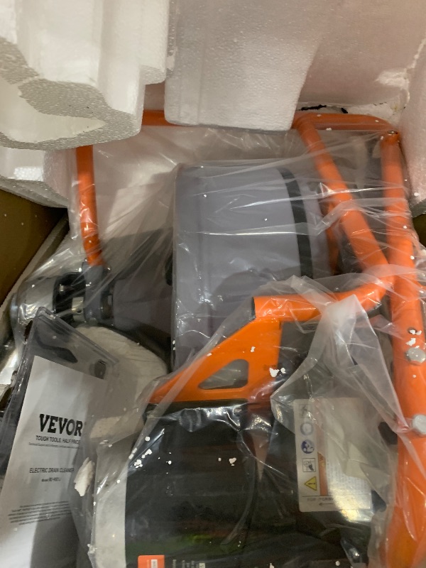 Photo 1 of VEVOR Drain Cleaner Machine 100 FT x 1/2 Inch, Sewer Auger Auto Feed with 4 Cutter & Air-activated Foot Switch for 2" to 4" Pipes, Orange, Black
