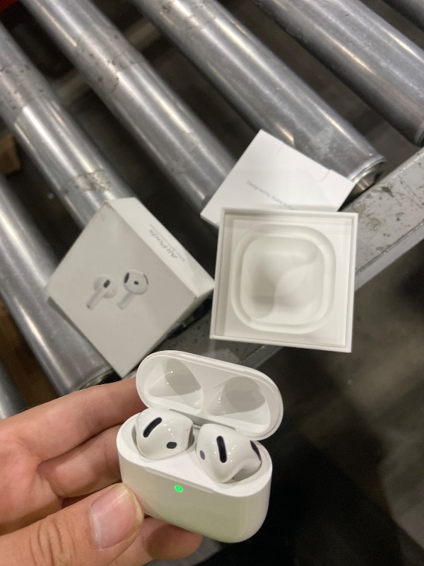 Photo 1 of Apple AirPods 4 Wireless Earbuds, Bluetooth Headphones, with Active Noise Cancellation, Adaptive, Transparency Mode, Personalized Spatial Audio, USB-C Charging Case, Wireless Charging, H2 Chip