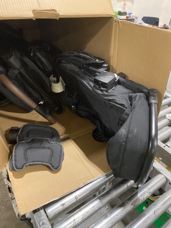 Photo 1 of Evenflo Shyft Intuiti+ Travel System Featuring Revolve180 LiteMax™ NXT Rotating Rear-Facing Lightweight Preemie and Infant Car Seat with SensorySoothe 3-30 lbs. (Dubhan Black)