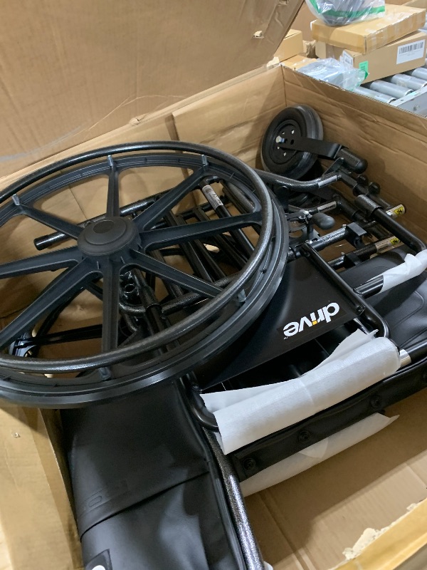 Photo 1 of Drive Medical Sentra EC Heavy Duty Bariatric Transport Wheelchair with Detachable Desk Arms and Swing-Away Footrests, Black