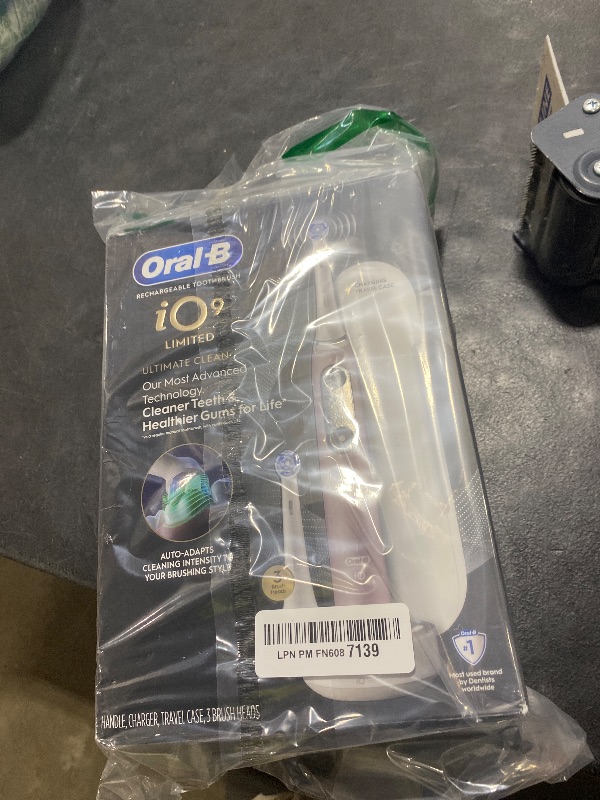 Photo 1 of Oral-B iO Series 9 Limited Rechargeable Rose Quartz Electric Toothbrush with (2) Ultimate Clean and (1) Gentle Care Replacement Brush Heads, White, Travel Case-White and Charger