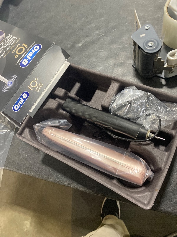 Photo 1 of Oral-B iO Series 9 Limited Rechargeable Rose Quartz Electric Toothbrush with (2) Ultimate Clean and (1) Gentle Care Replacement Brush Heads, White, Travel Case-White and Charger