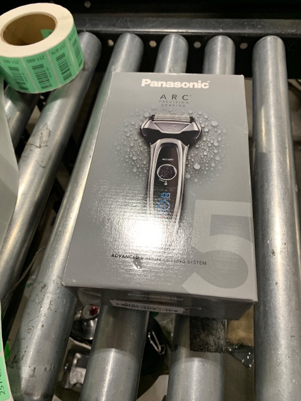 Photo 1 of Panasonic ARC5 Electric Razor for Men with Pop-Up Trimmer, Wet/Dry 5-Blade Electric Shaver with Intelligent Shave Sensor and Multi-Flex Pivoting Head – ES-LV65-S (Silver)