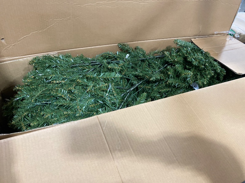 Photo 1 of National Tree Company 7.5 ft Pre-Lit Dunhill Fir Artificial Christmas Tree, 700 LED Lights, 2,514 Tips, Foot Pedal, 10 Light Functions, Includes Stand, Green