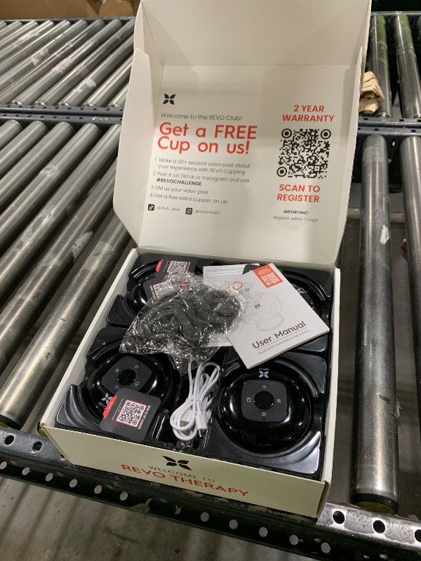 Photo 1 of REVO The Original 4-in-1 Smart Cupping Therapy Massager, Red Light Therapy for Targeted Pain Relief, Knots, Aches, Muscle Soreness, Circulation & Tighter Skin, Portable Cupping Kit (Four Pack)